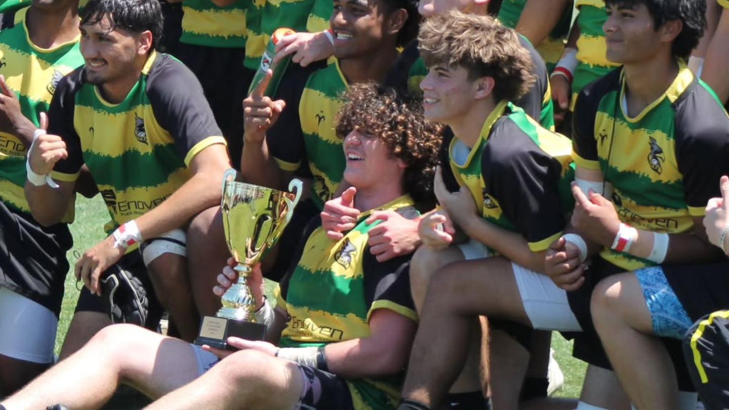 Sam Enochian with the Carmichael Hawks and their 2026 Northern California Gold championship trophy.