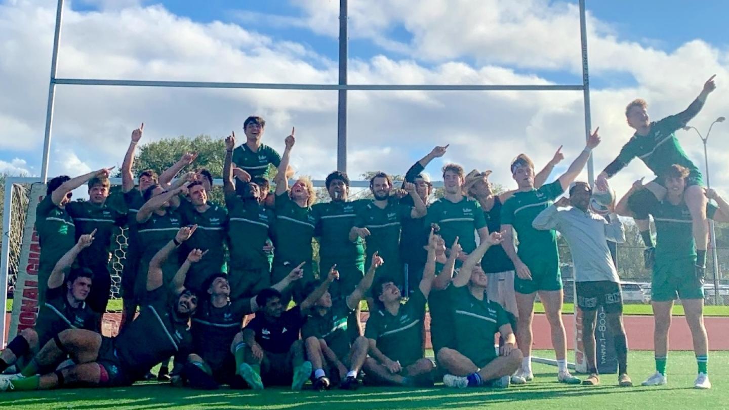 USF players with the "Gozilla!" pose after beating FAU.