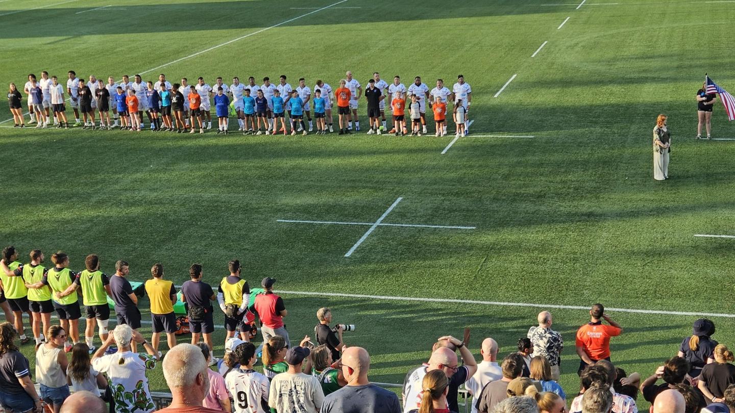 USA players line up for the anthem. Photo Alex Goff.
