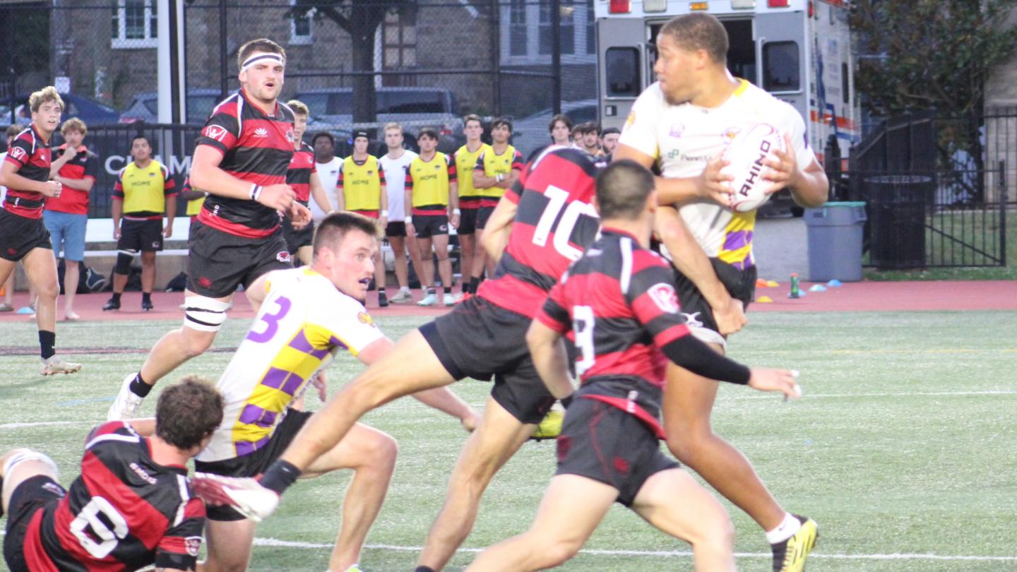 West Chester's Elisha Ross looks to offload to Aidan Malley. Both made the list. Alex Goff photo.