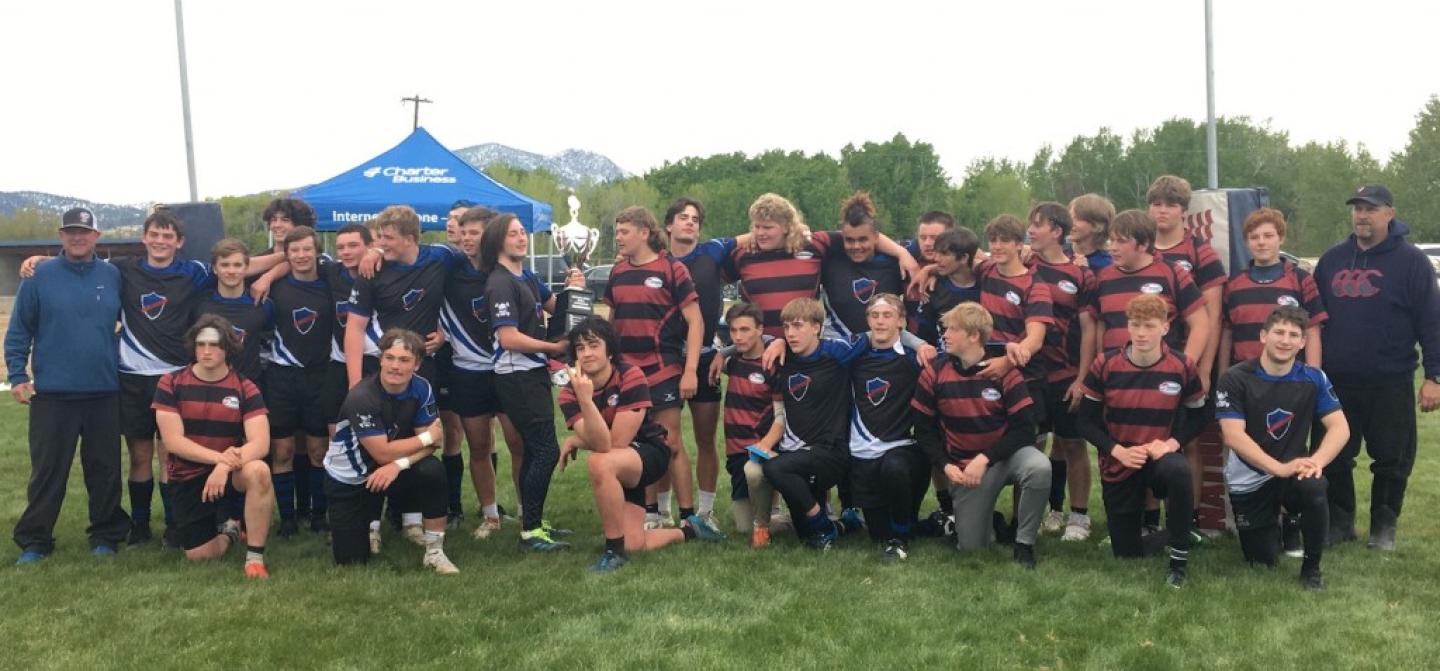 black blue mud dogs after championship game