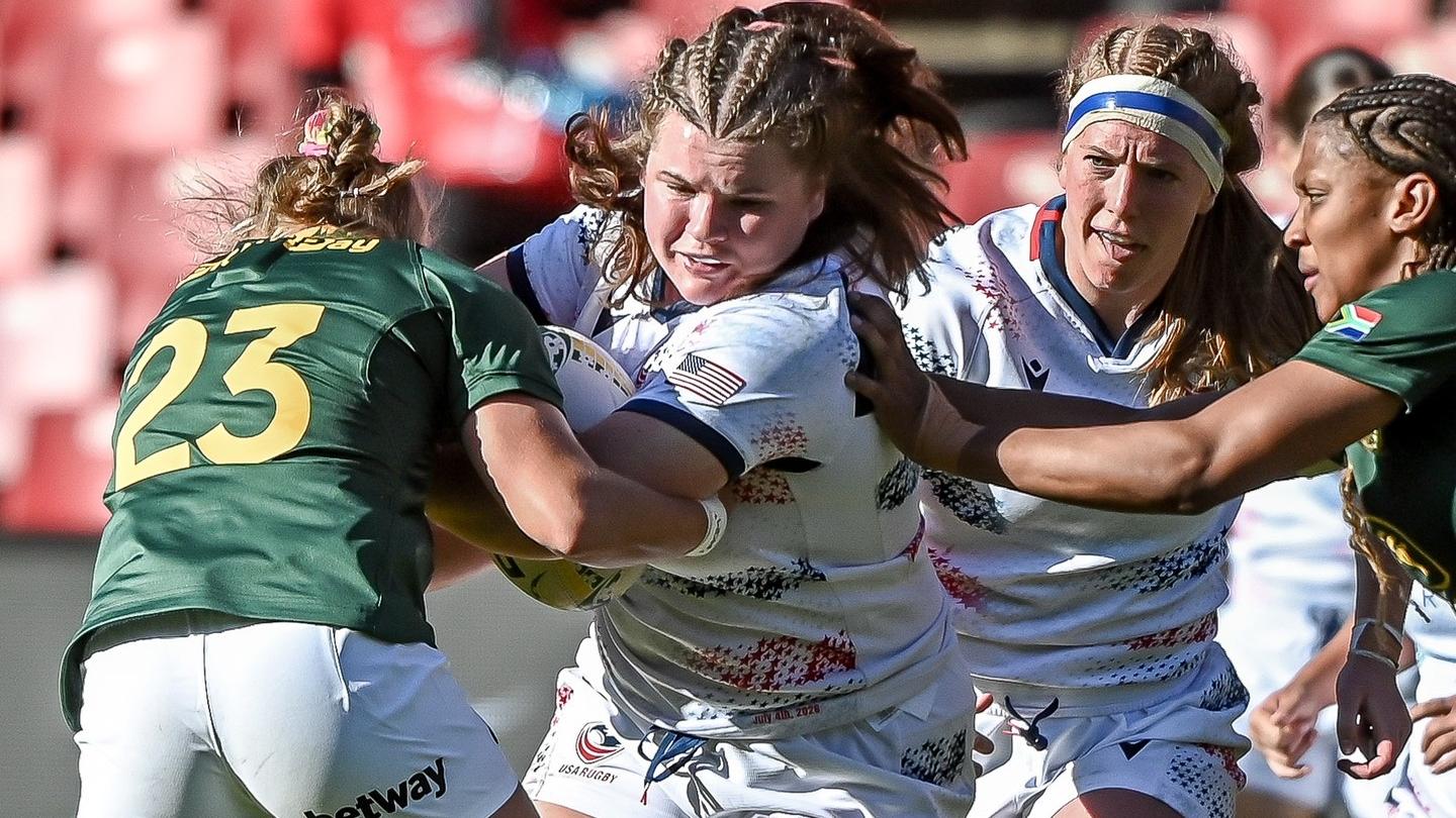 Caroline Cook charges on with Georgia Perris-Redding in support.