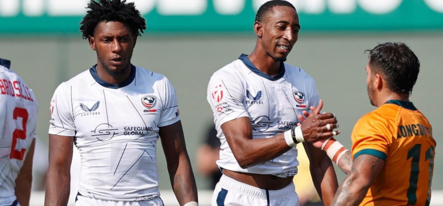 perry baker handshake dubai mike lee   klc fotos for world rugby