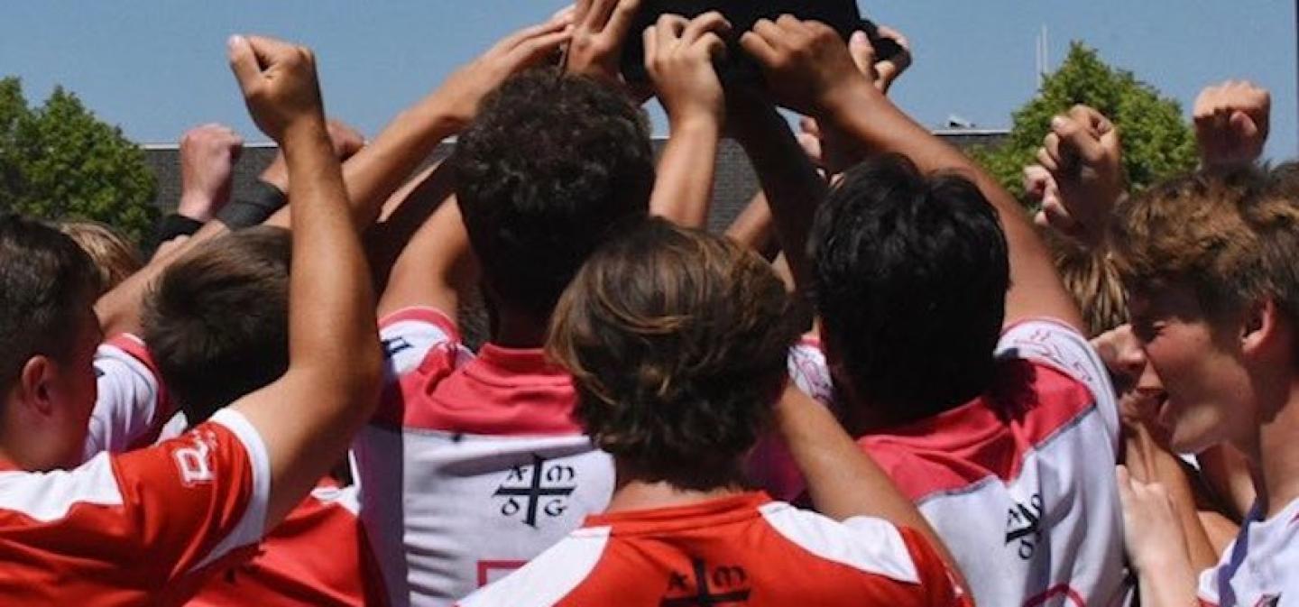 regis jesuit boys celebrate