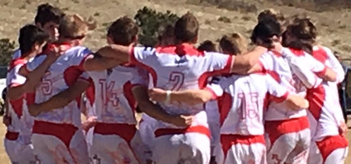 regis jesuit huddle